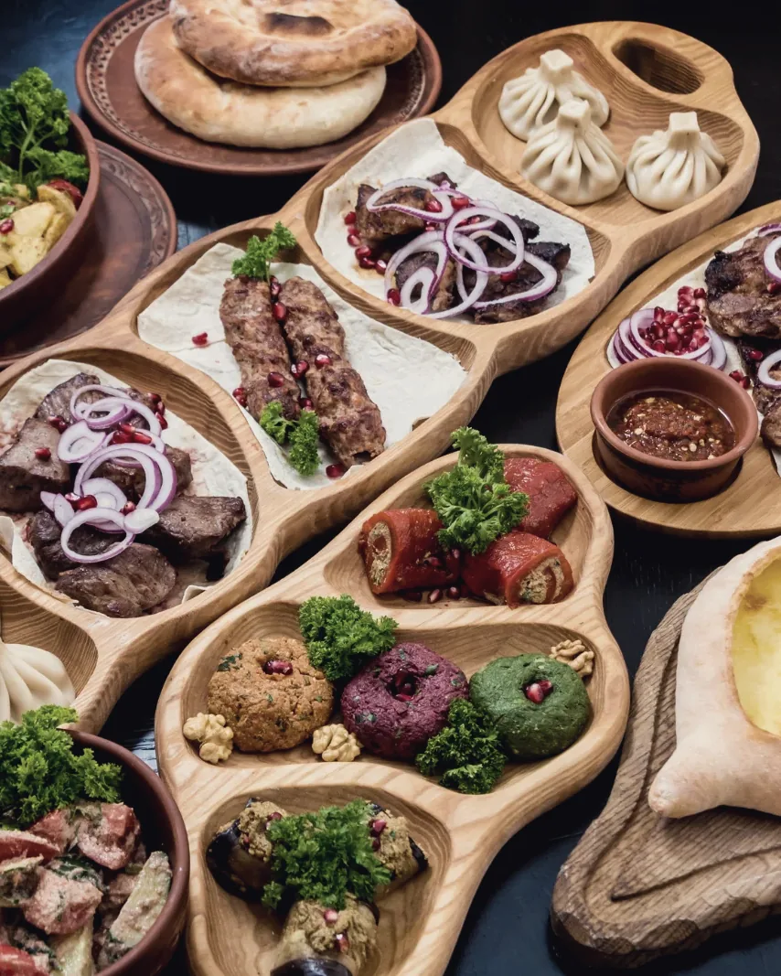 A Georgian supra table, laden with food — a symbol of Georgian hospitality